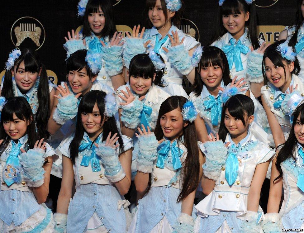 Japanese all girl band AKB-48 arrive at the 22nd Golden Melody Awards in Taipei on June 18, 2011