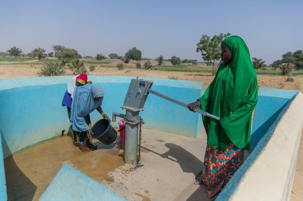 Women pump water