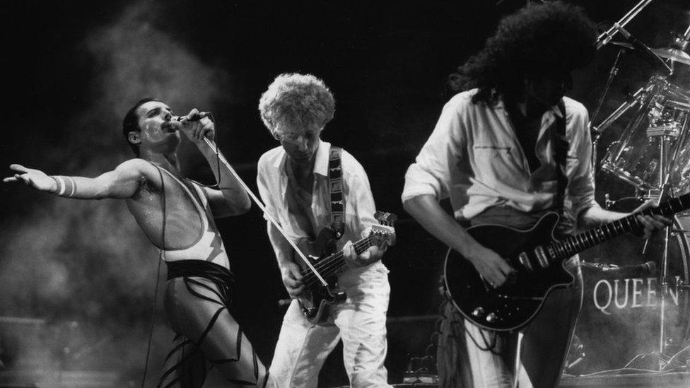 Queen performing live