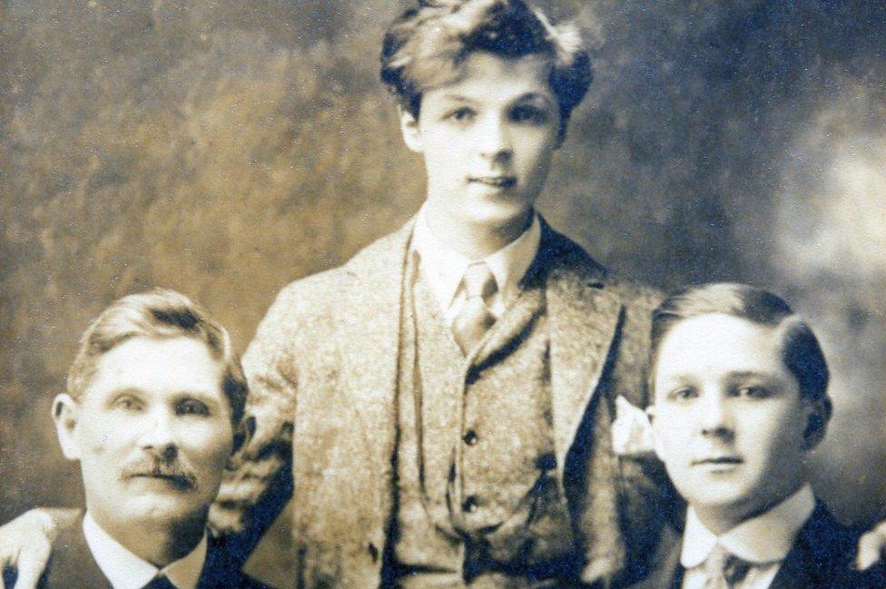 Gareth Hughes is pictured with his father and brother