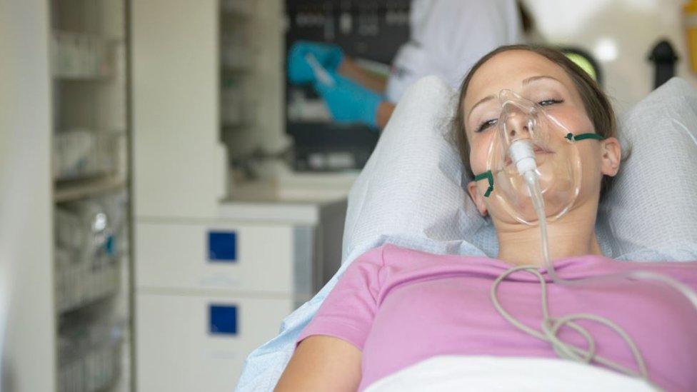 woman in hospital bed