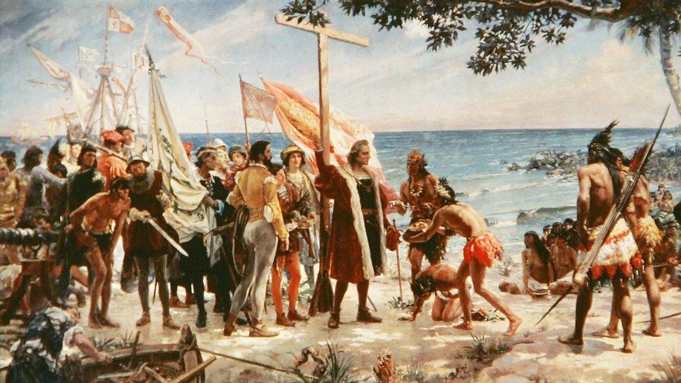 An undated painting shows Christopher Columbus arriving at one of the Caribbean islands on his voyage of discovery from the Naval Museum in Madrid