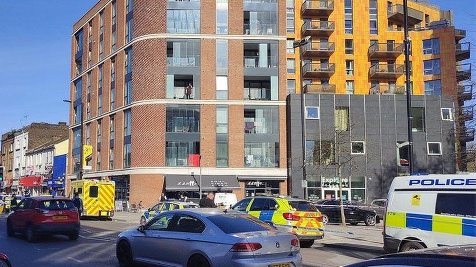 Emergency service in Barking Road, Canning Town, in April 2021