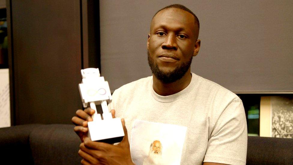 Stormzy accepts his AIM Award