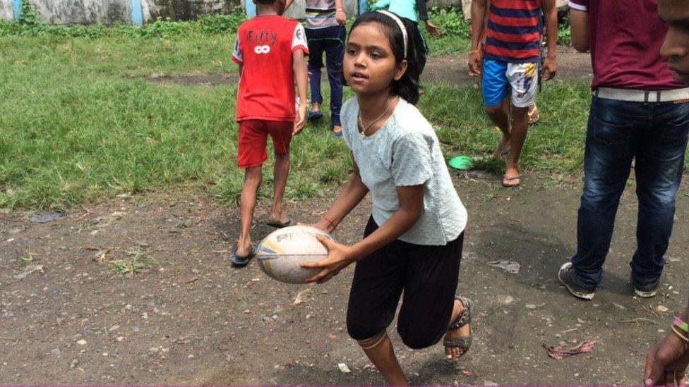 Young girl playing rugby in Kolkata