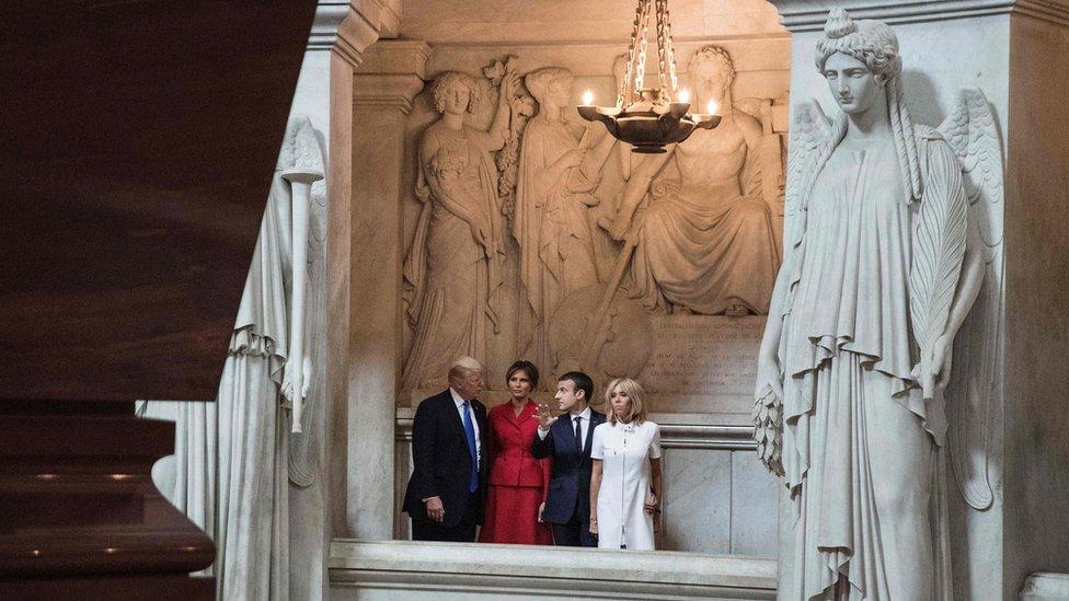 US President Donald Trump, First lady Melania Trump, French President Emmanuel Macron, and his wife Brigitte Macron visit Napoleon Bonaparte's tomb at Les Invalides in Paris, on July 13, 2017.