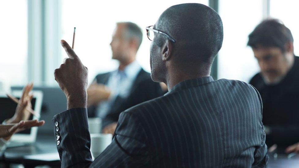 Business boardroom with diverse range of people