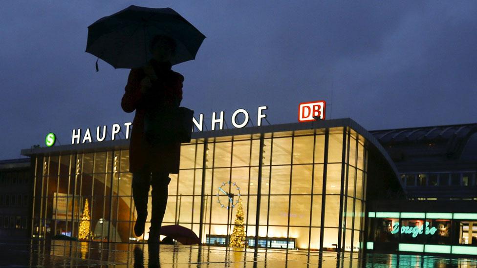 A woman outside the Cologne station