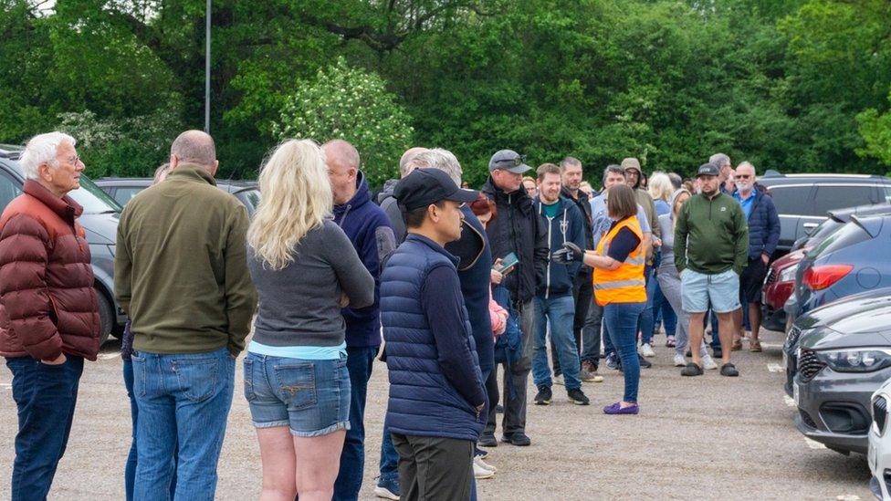 People queuing for water