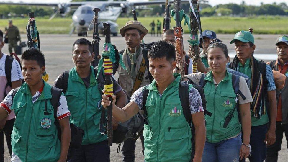 Indigenous people (18 from the Murui and Siona ethnic group, and 7 Coreguajes from Caqueta department) arrive at the San Jose del Guaviare airport to join other indigenous search groups who know the jungle well and will combine their knowledge to help in the search for the four young brothers lost in the jungle after their Cessna 206 plane crashed, in Guaviare, Colombia, 21 May 2023