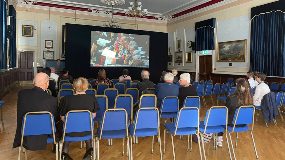 Mourners in Jersey watch the funeral of Queen Elizabeth II