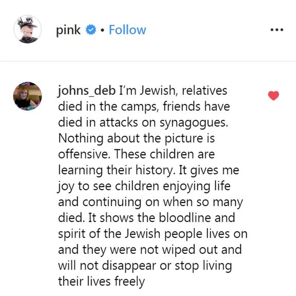 A post from Instagram. It reads: "I'm Jewish, relatives died in the camps, friends have died in attacks on synagogues. Nothing about the picture is offensive. These children are learning their history. It gives me joy to see children enjoying life and continuing on when so many died. It shows the bloodline and spirit of the Jewish people lives on and they were not wiped out and will not disappear or stop living their lives freely."