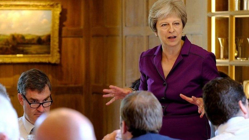 Theresa May addressing ministers at Chequers