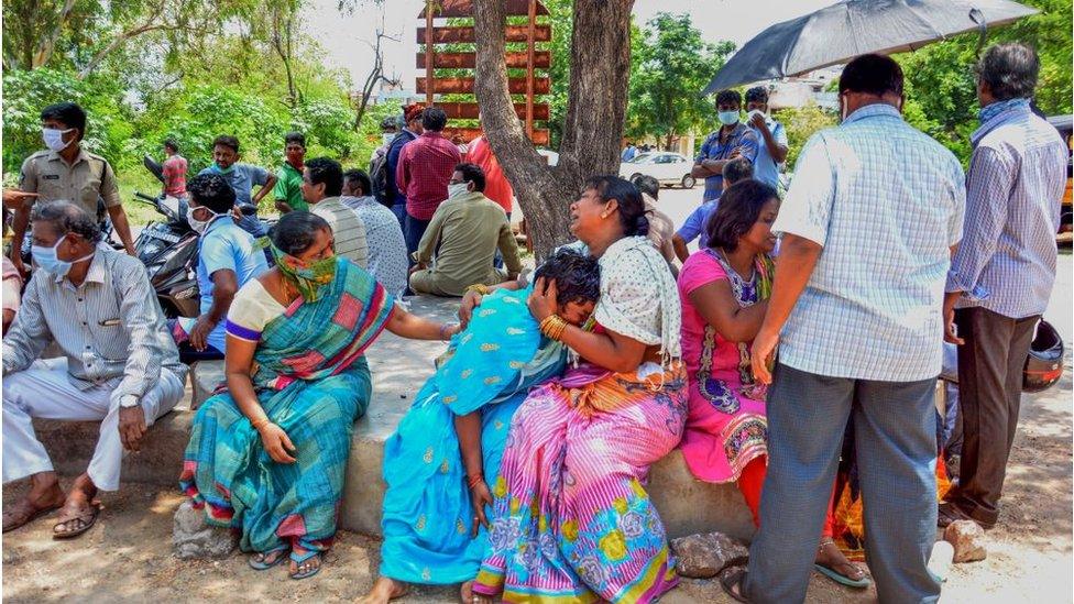 Family members react as they mourn deceased relatives a day after a gas leak incident at LG Polymers plant, at King George Hospital mortuary in Visakhapatnam.