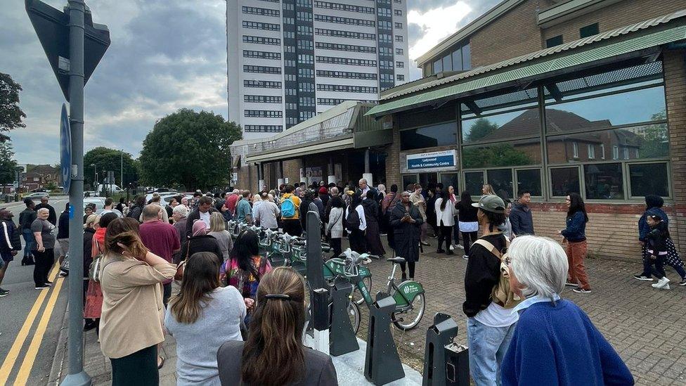 Large crowds outside the community centre