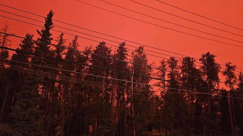 Photo of a red sky outside Michel Labine's home in the Northwest Territories