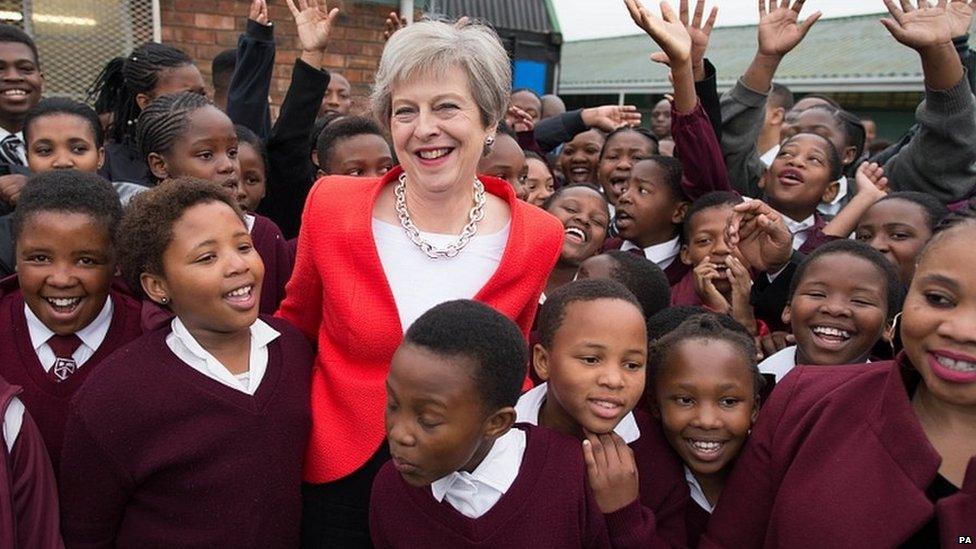 Theresa May meets students and staff at I.D. Mkize Secondary School in Cape Town, which is twinned with Whitby High School in Yorkshire