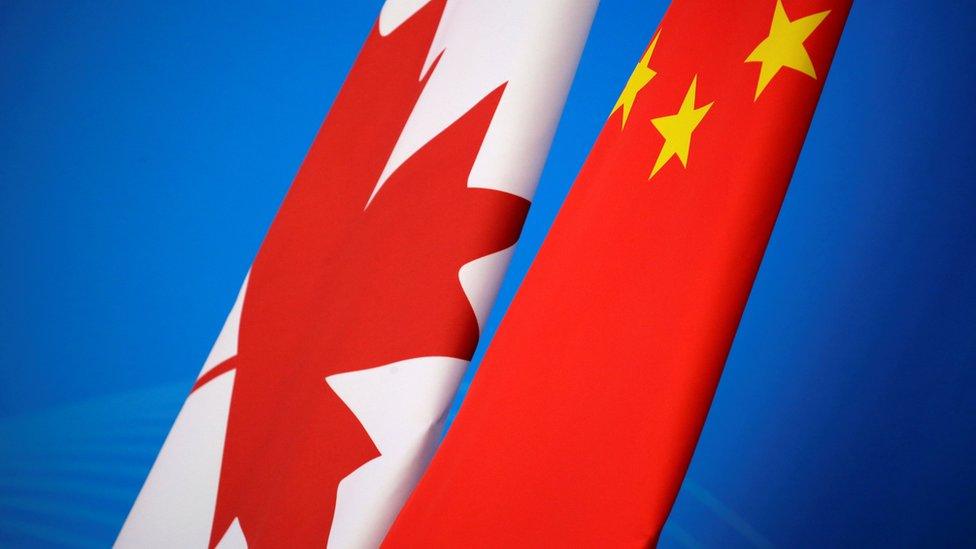 Flags of Canada and China are placed for the first China-Canada economic and financial strategy dialogue in Beijing