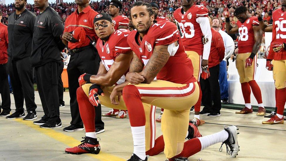 Colin Kaepernick and Eric Reid kneeling