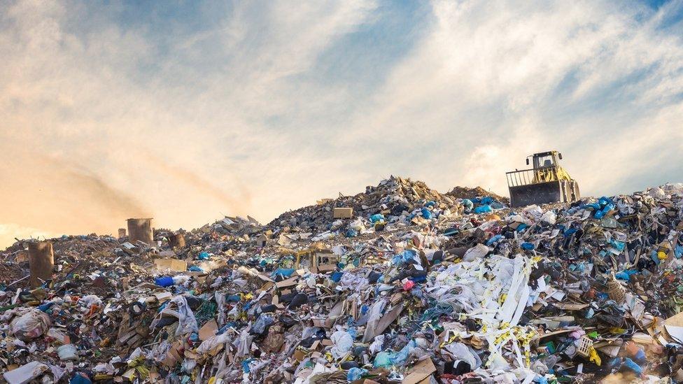 build up of rubbish on a landfill site