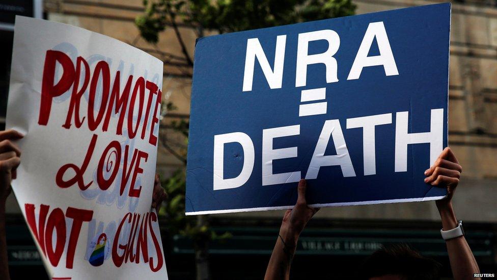 Banners promoting love not guns