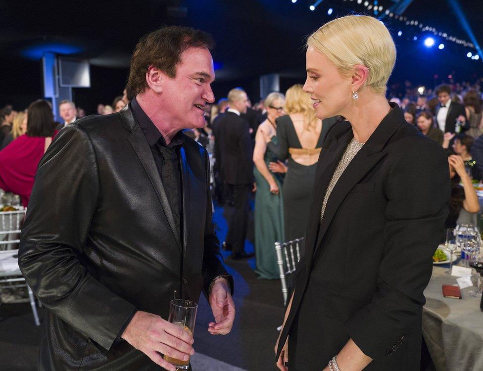 Quentin Tarantino and Charlize Theron