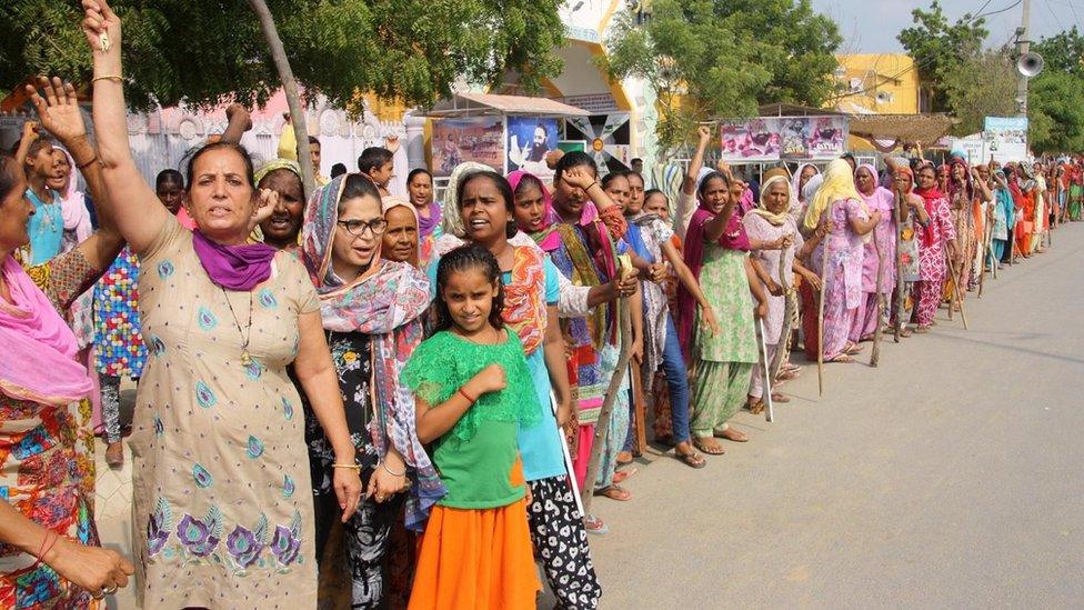 Women supporters ahead of the verdict