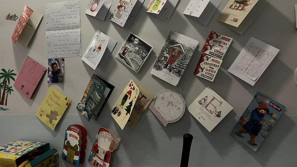 Christmas cards on a wall