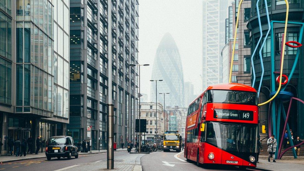 Photo of a bus driving through London