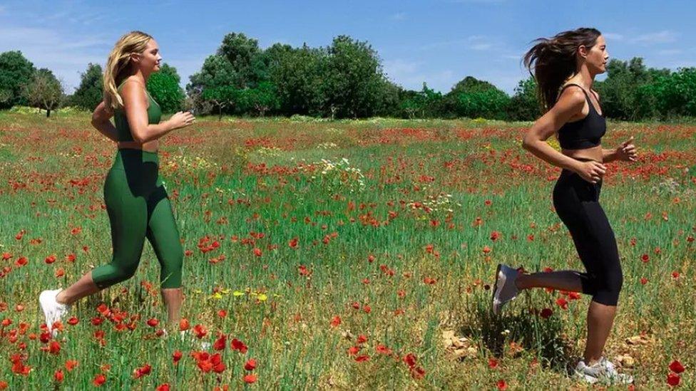 Two women running in Lycra