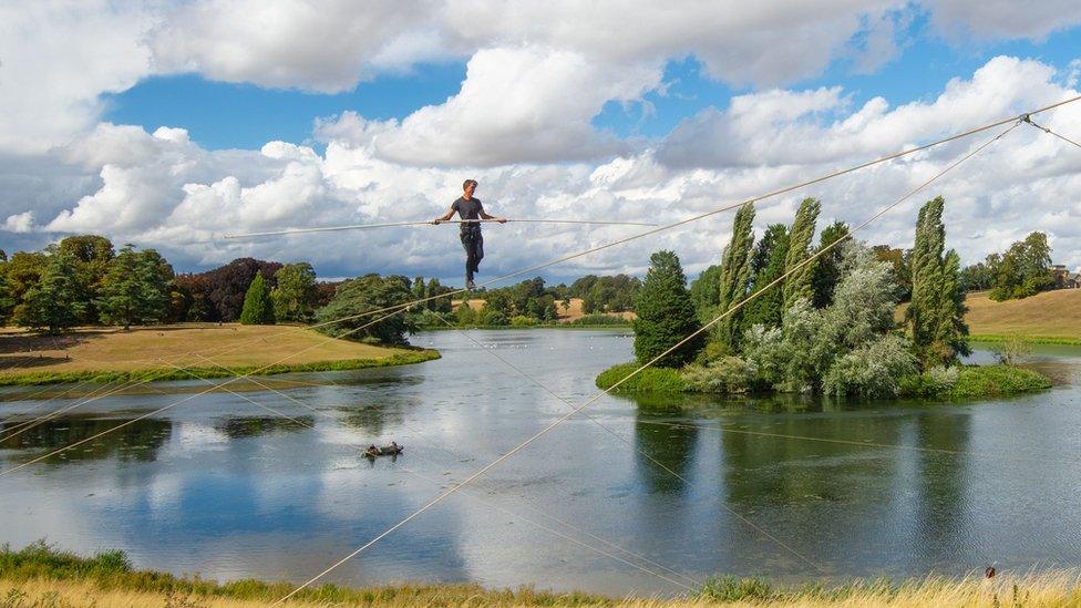 Christopher Bullzini walking along the high wire