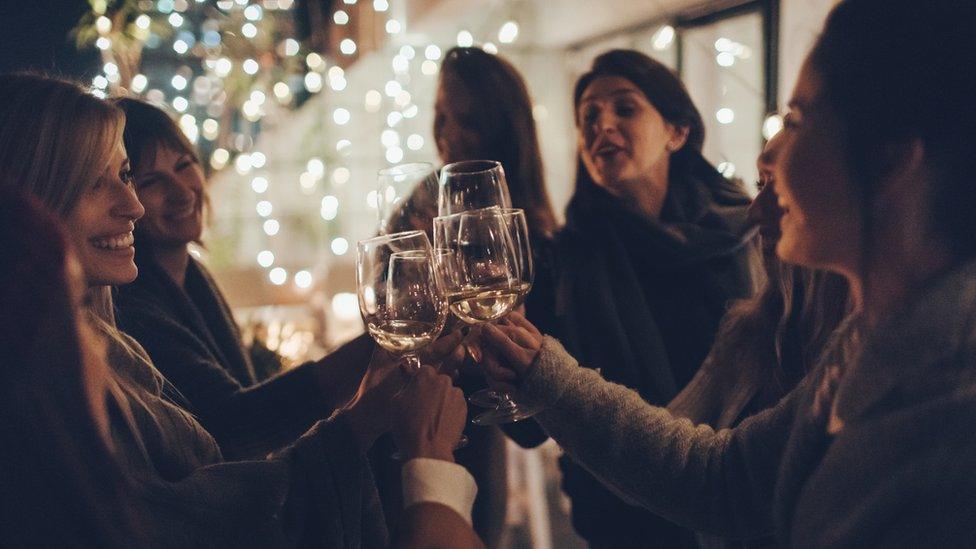 Smiling women enjoying out night out