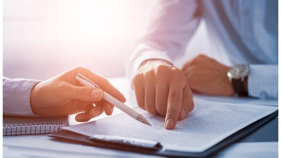 Stock image of people writing