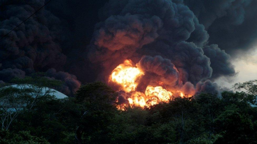 a fire at a fuel storage tank belonging to the Puma Energy company in Puerto Sandino, Leon, Nicaragua August 18, 2016.