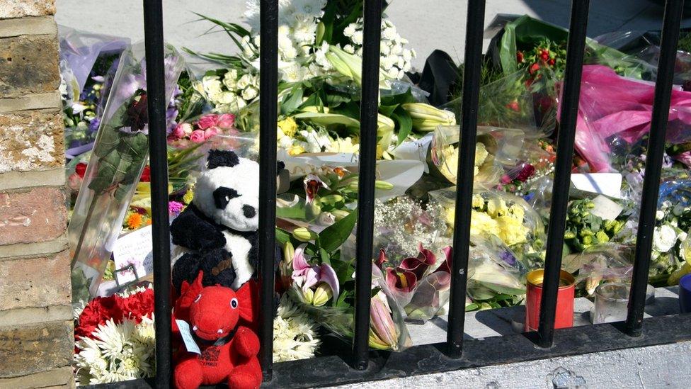 Flowers and letters of condolence are seen in the area outside Kings Cross Station set aside for floral tributes, 12/07/2005, following the London terror attack on 7th July 2005.