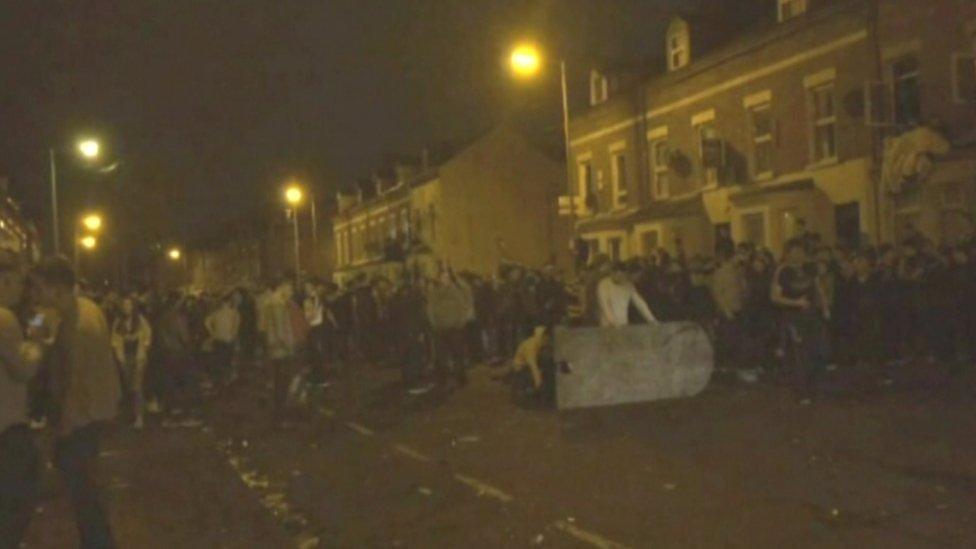 Trouble broke out as hundreds of students and other young people celebrated St Patrick's Day in Belfast's Holyland during the early hours of 17 March