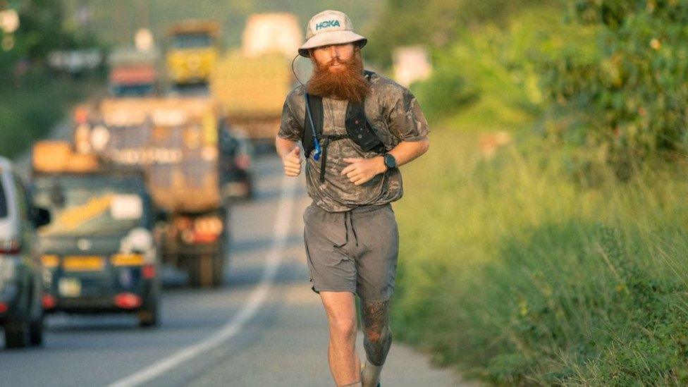 Russell Cook running in Africa