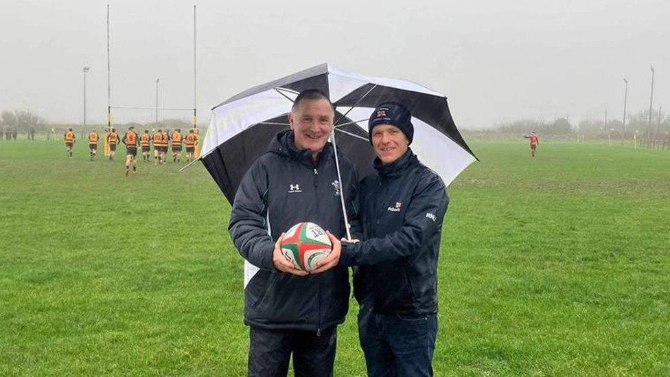 Darrell Willington, Gareth's brother, was given the rugby ball from Coxswain Will Chant on rugby pitch