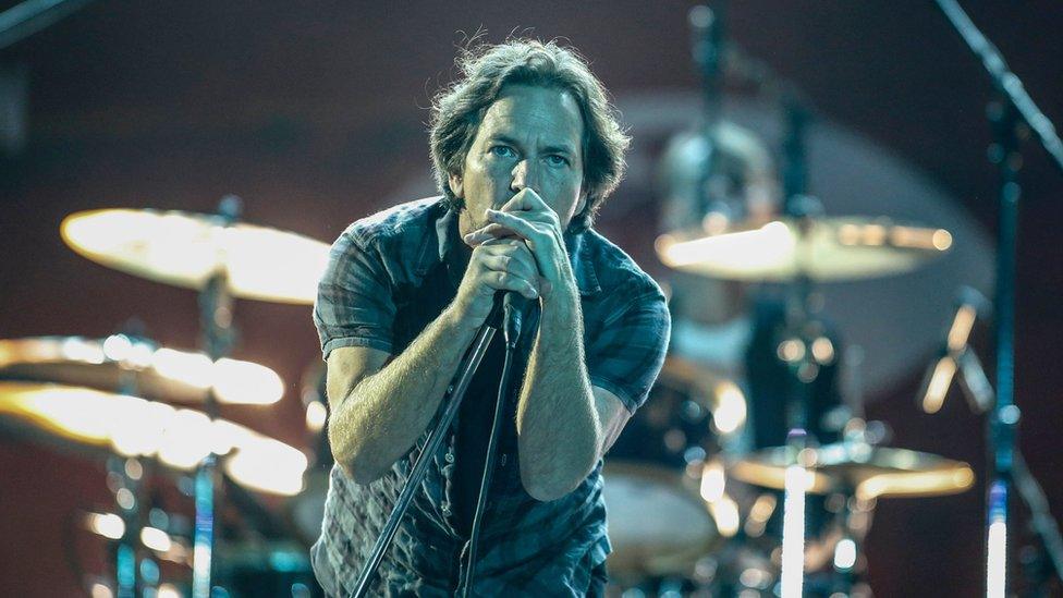 This file photo taken on September 26, 2015 shows Eddie Vedder of Pearl Jam performing