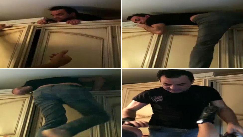 A wanted mafia boss climbs down from his hiding place