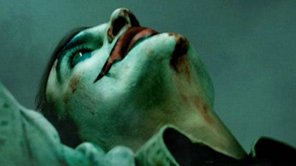 Joaquin Phoenix as The Joker