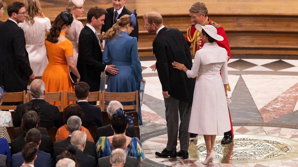 Prince Harry, Duke of Sussex, and Meghan, Duchess of Sussex, look for their seats in St Paul's Cathedral