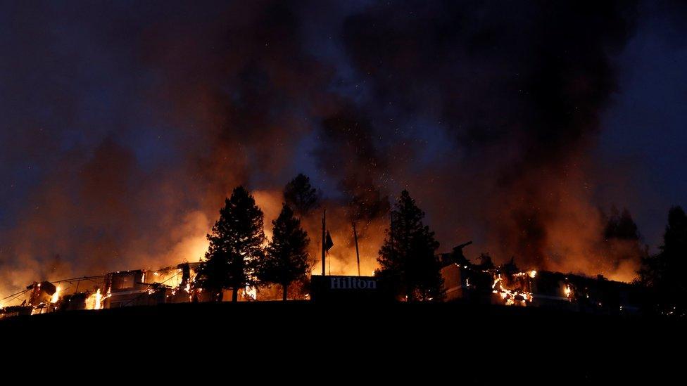 Flames light up the night sky