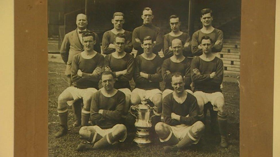 An team photo is among the items on display