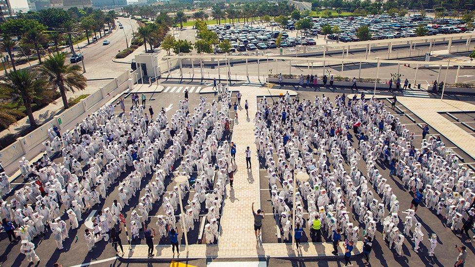 Group of people dressed as astronauts