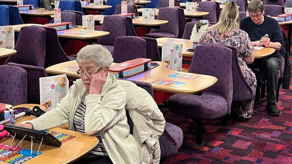 Janet Gibson focuses on her game in the main hall