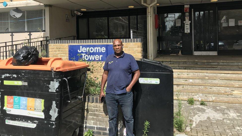 Salah Hassanein stands outside the block