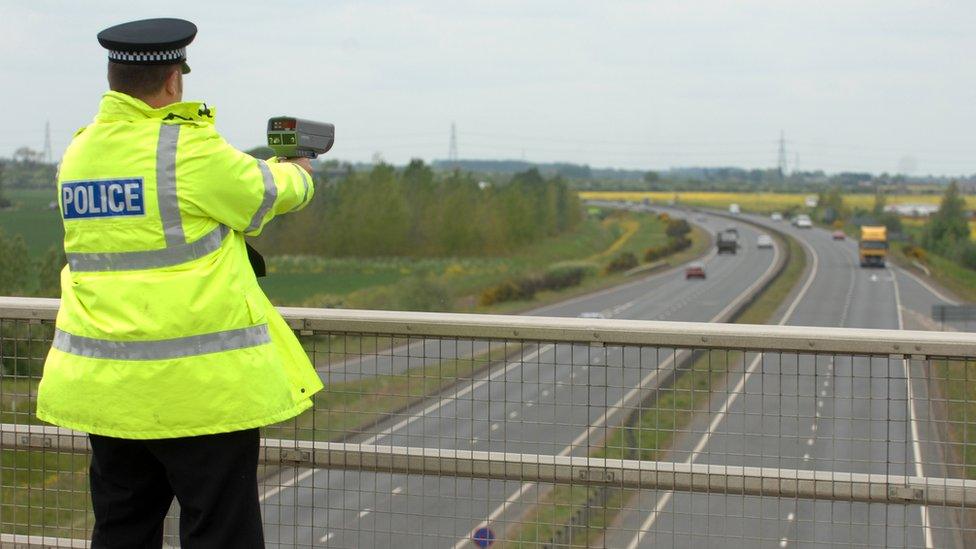 Police with speed gun