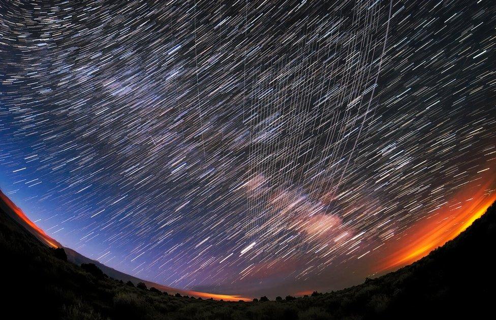 Starlink Satellites pass overhead near Carson National Forest, New Mexico, photographed soon after launch