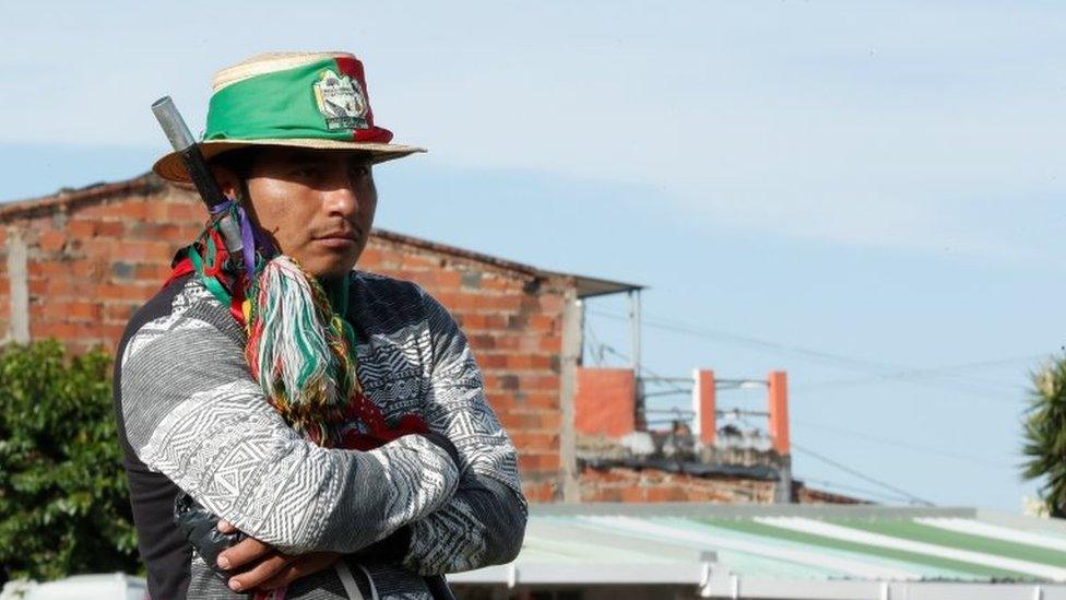 An indigenous man prepares before leaving in a caravan from Fusagasuga to Bogota, Colombia, 18 October 2020.